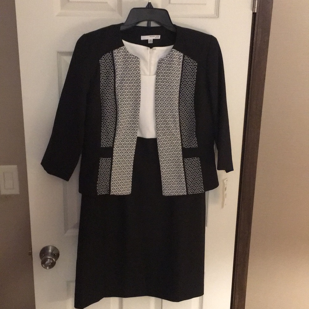 Black/white sleeveless dress with jacket.